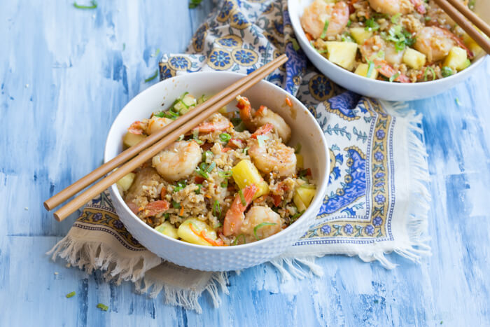 This Shrimp Cauliflower Fried Rice is ready in just 25 minutes! This is the perfect dish for a quick, need it in a hurry Monday through Friday meal or just as a healthier alternative to the standard cozy “take out and a movie” meal.